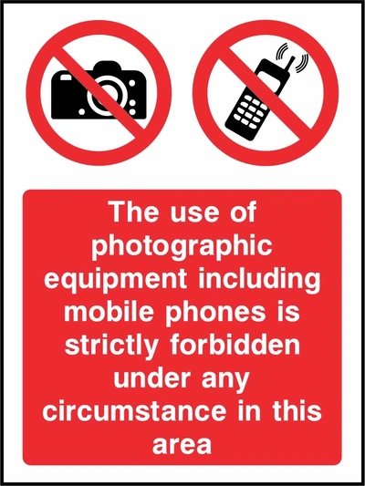 The use of photographic equipment including mobile phones is strictly forbidden under any circumstance in this area sign showing red camera and mobile phone prohibition symbol above wording. Artwork