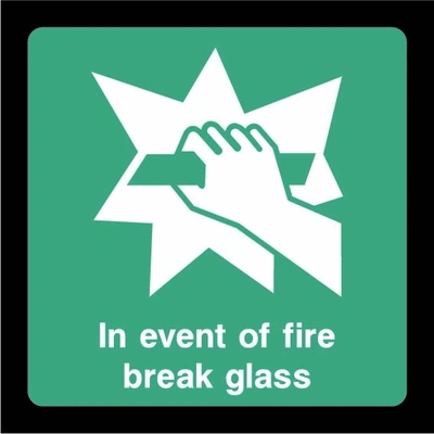 Green and white In event of fire break glass sign showing hand breaking glass pictogram. Artwork EMER0065.