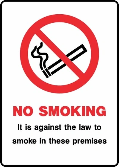 No Smoking — It is against the law to smoke in these premises sign. red no-smoking pictogram with black and red wording in a rounded border. Artwork SMOK0075.