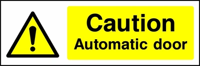 Caution — Automatic door sign showing yellow exclamation warning pictogram beside wording. Artwork GENE0010.