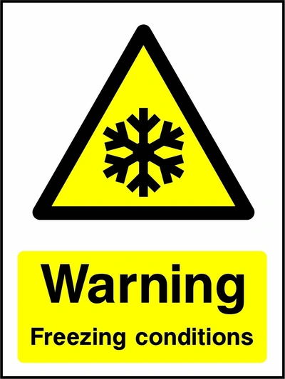 Warning — Freezing conditions sign showing yellow snowflake warning pictogram above wording. Artwork GENE0086.