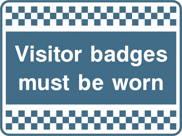 Visitor badges must be worn sign. white text on blue-grey with a chequered border. Artwork SECU0088.