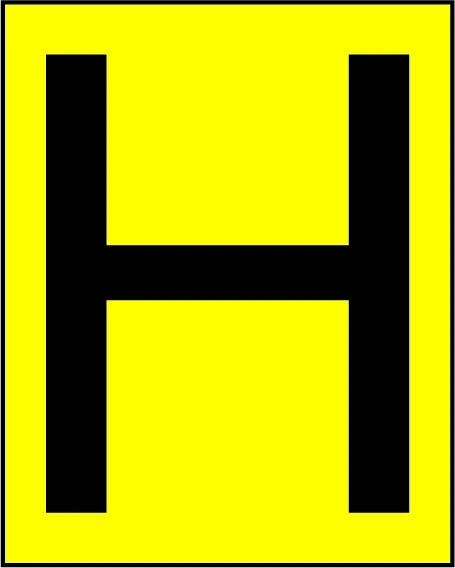 H sign showing yellow hydrant marker with black H. Artwork FEQP0027.