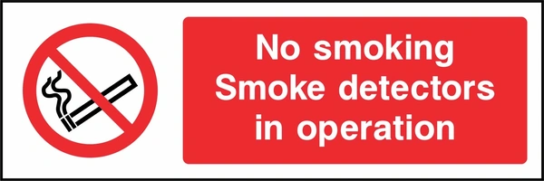 No smoking — Smoke detectors in operation sign. red cigarette or naked-flame prohibition pictogram beside a red wording panel. Artwork SMOK0015.