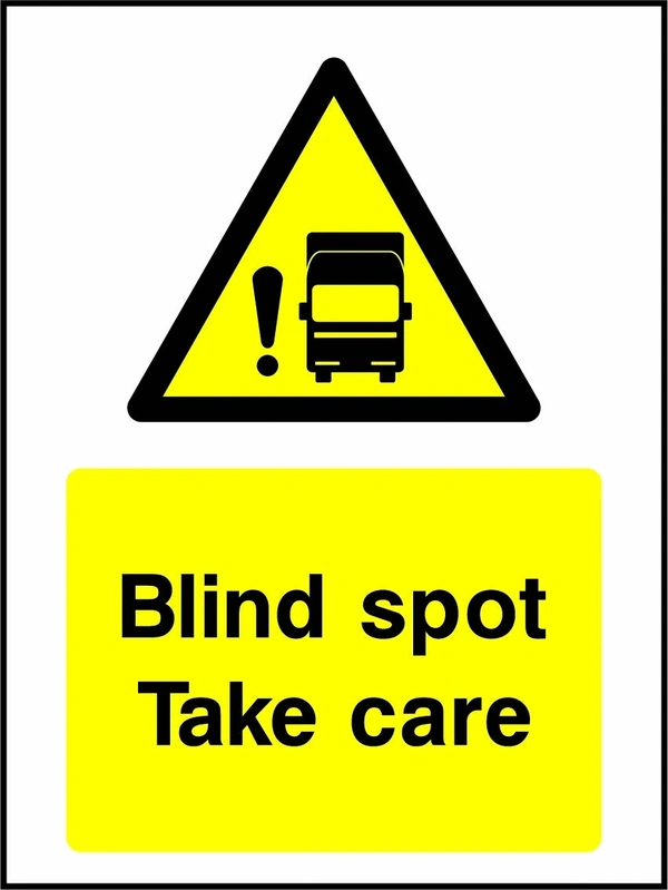 Blind spot — Take care sign showing yellow truck and exclamation warning pictogram above wording. Artwork GENE0094.