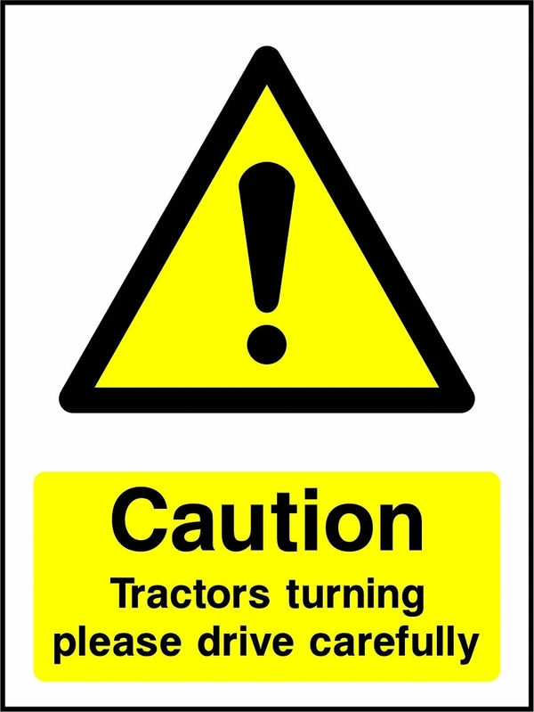 Caution — Tractors turning please drive carefully sign showing yellow warning triangle and exclamation mark above wording. Artwork COUN0065.