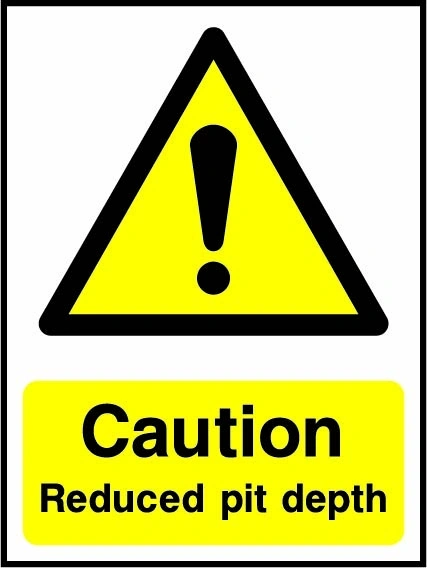 Caution — Reduced pit depth sign showing yellow exclamation warning triangle above wording. Artwork LIFT0010.