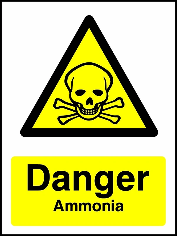 Danger — Ammonia sign with yellow triangular skull and crossbones pictogram above wording. Artwork CHEM0056.