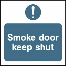 Smoke door keep shut sign showing blue exclamation pictogram above wording. Artwork FPRV0029.