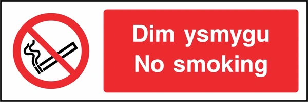 Dim ysmygu — No smoking sign. red cigarette or naked-flame prohibition pictogram beside a red wording panel with supplied Welsh and English wording. Artwork SMOK0035.
