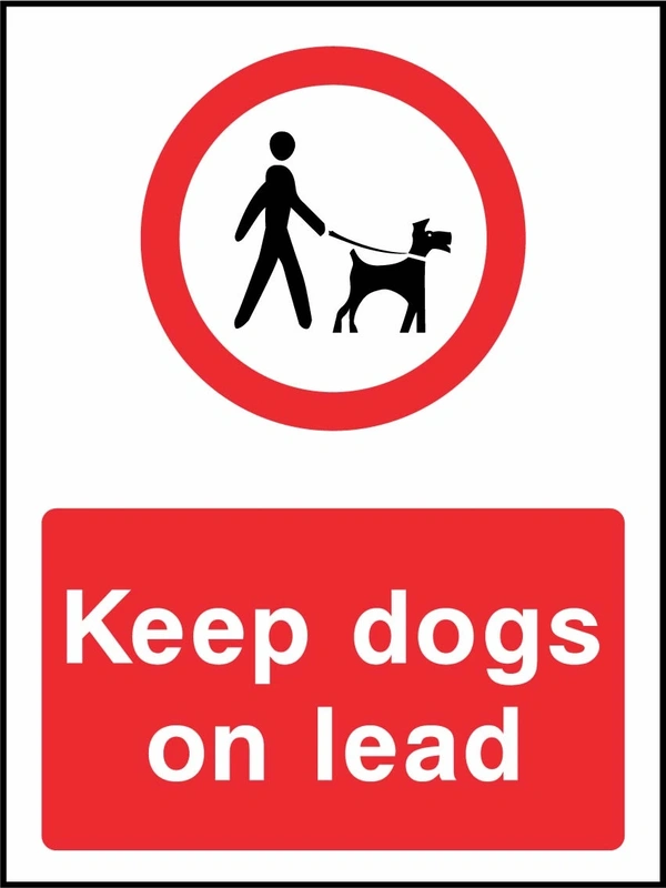 Keep dogs on lead sign showing red prohibition pictogram above wording. Artwork COUN0070.