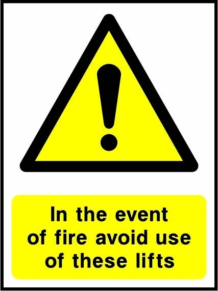 In the event of fire avoid use of these lifts sign showing yellow exclamation warning triangle above wording. Artwork LIFT0012.